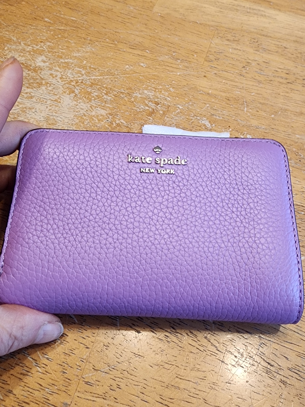 Kate Spade New York Lena Medium Bifold Wallet in a lavender or wisteria purple